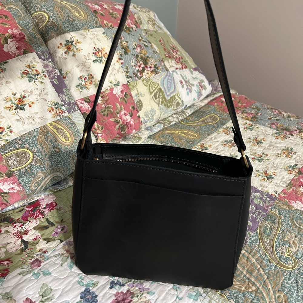 Portland, leather goods, black triangle purse.